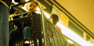 child in shopping cart