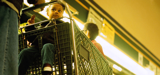 child in shopping cart