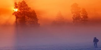 photographer capturing sunrise