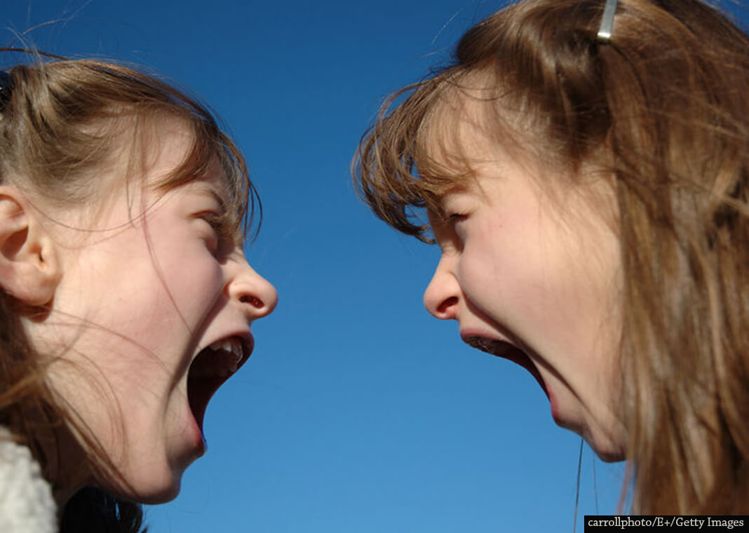 girls screaming at each other - carrollphoto/E+/Getty Images
