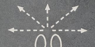 footprints and directional arrows - photo by imelenchon via Morguefile