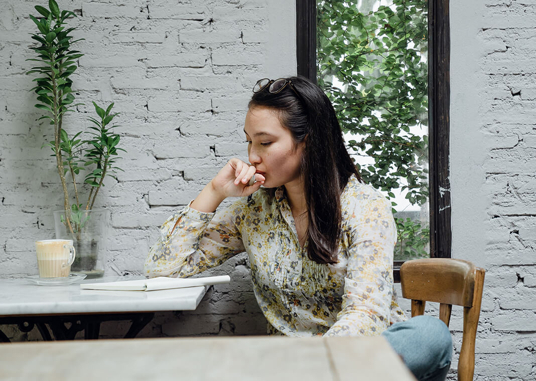 anxious woman with notebook - photo by Ketut Subiyanto via Pexels.com