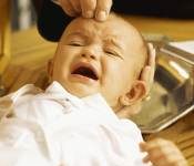 crying baby at Baptism