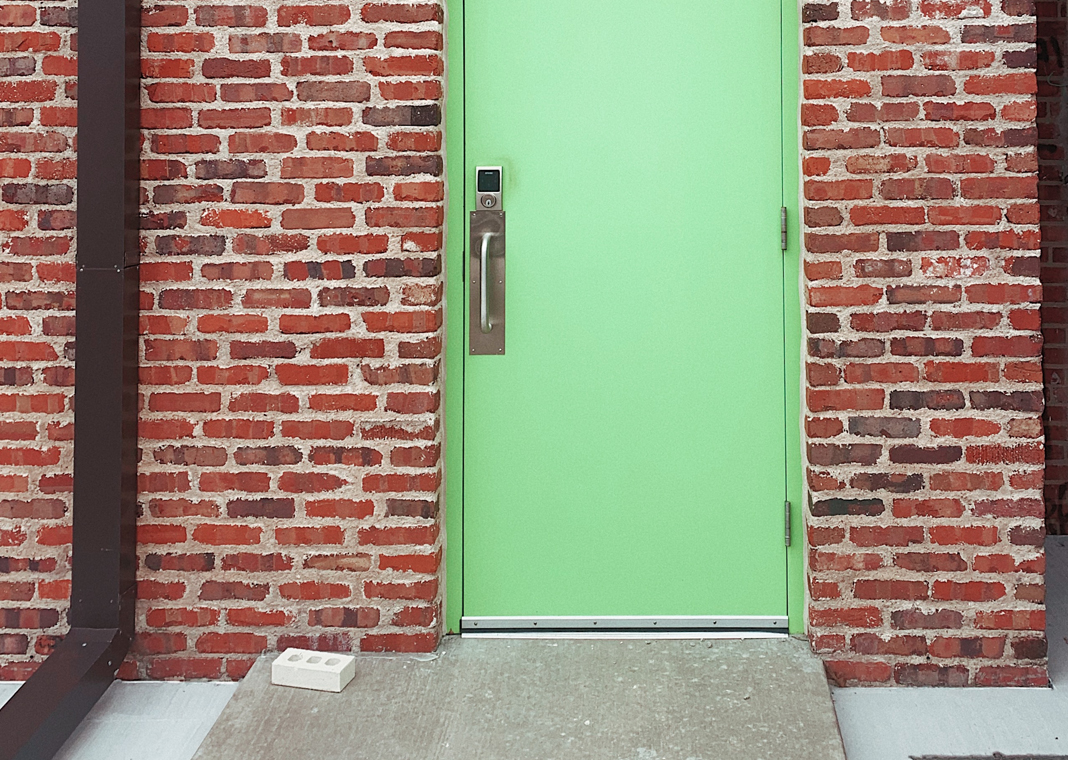 green door - photo by Skyler Smith on Unsplash