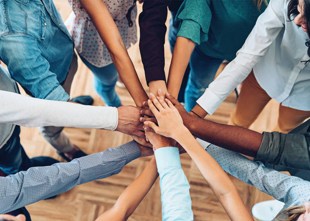 hands - all in circle - pixelfit/E+/Getty Images