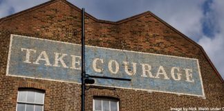 "Take Courage" painted on building - image by Nick Webb under CC BY 2.0