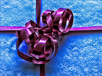 gift tied with purple ribbon