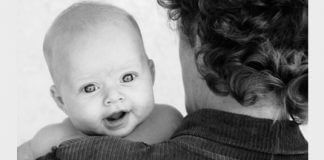 baby over mother's shoulder