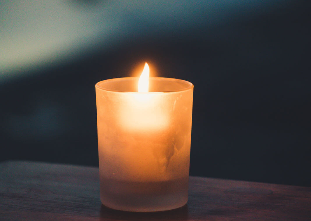 candle - photo by Paolo Nicolello on Unsplash