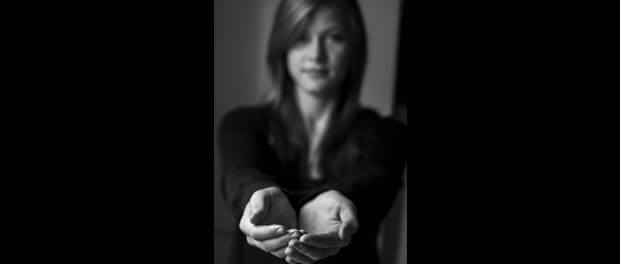 girl with open hands out offering gift