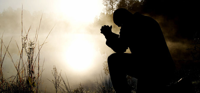 man praying