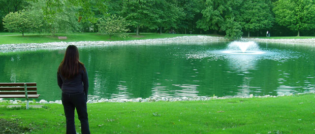 reflective woman at park