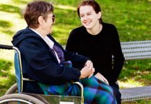 intergenerational friends talking in the park