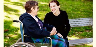 intergenerational friends talking in the park