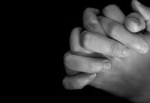 hands folded in prayer