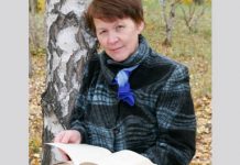 woman outdoors with book