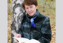 woman outdoors with book