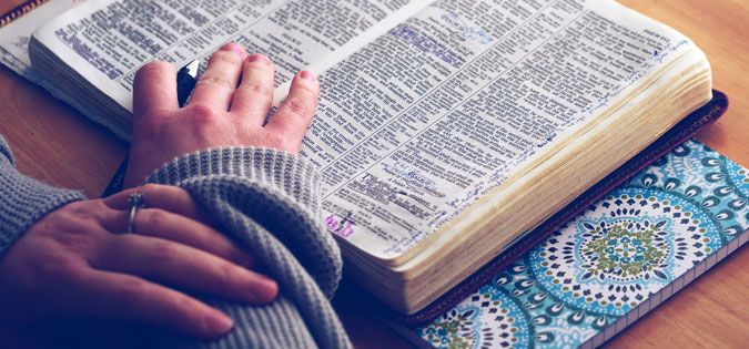 studying Bible during prayer