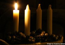 First Sunday of Advent candle lit - image by Susanne Nilsson (cropped) under CC BY-SA 2.0