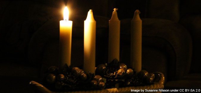 First Sunday of Advent candle lit - image by Susanne Nilsson (cropped) under CC BY-SA 2.0