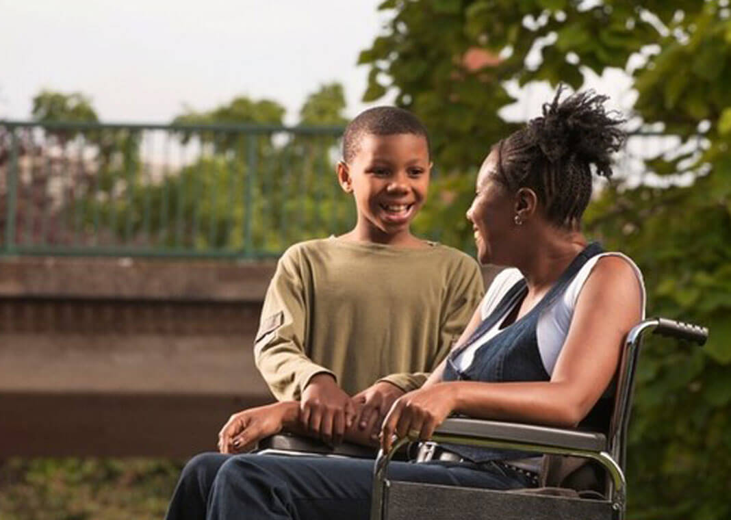 positive mother and son outdoors