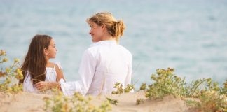 mother and daughter on the beach