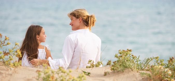 mother and daughter on the beach