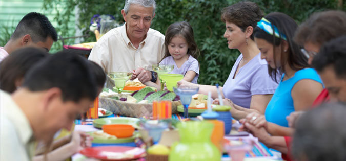 family eating outdoors