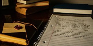 journals and other books and papers on desk