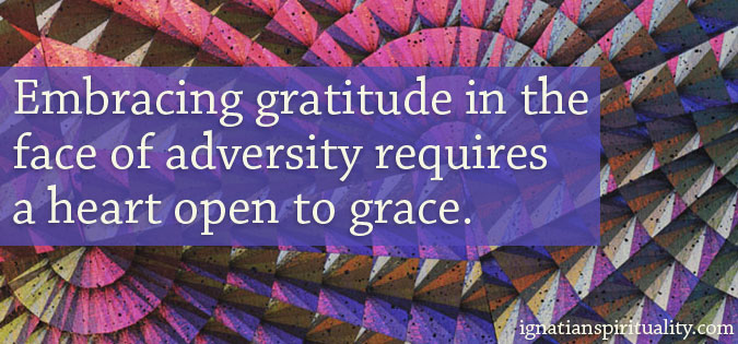 Text - Embracing gratitude in the face of adversity requires a heart open to grace. - on background of shapes