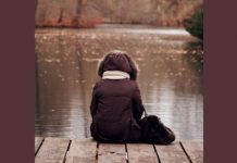 woman sitting alone