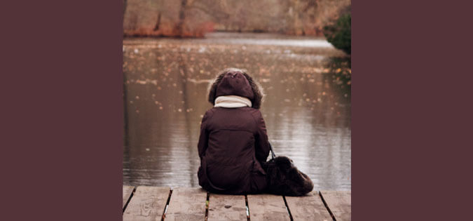 woman sitting alone