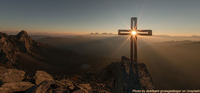 light shining through cross