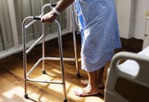 person with walker in hospital