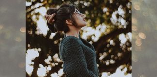 woman breathing fresh air - photo by Caique Silva on Unsplash