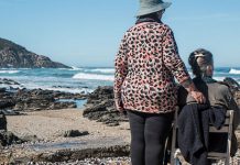 female friends looking out over the sea