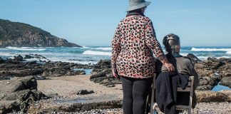 female friends looking out over the sea