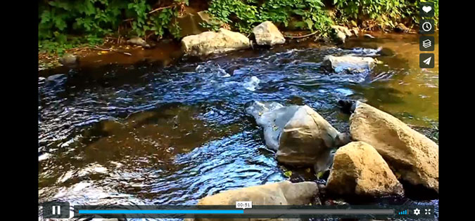 Offering Gifts video screenshot - water on rocks