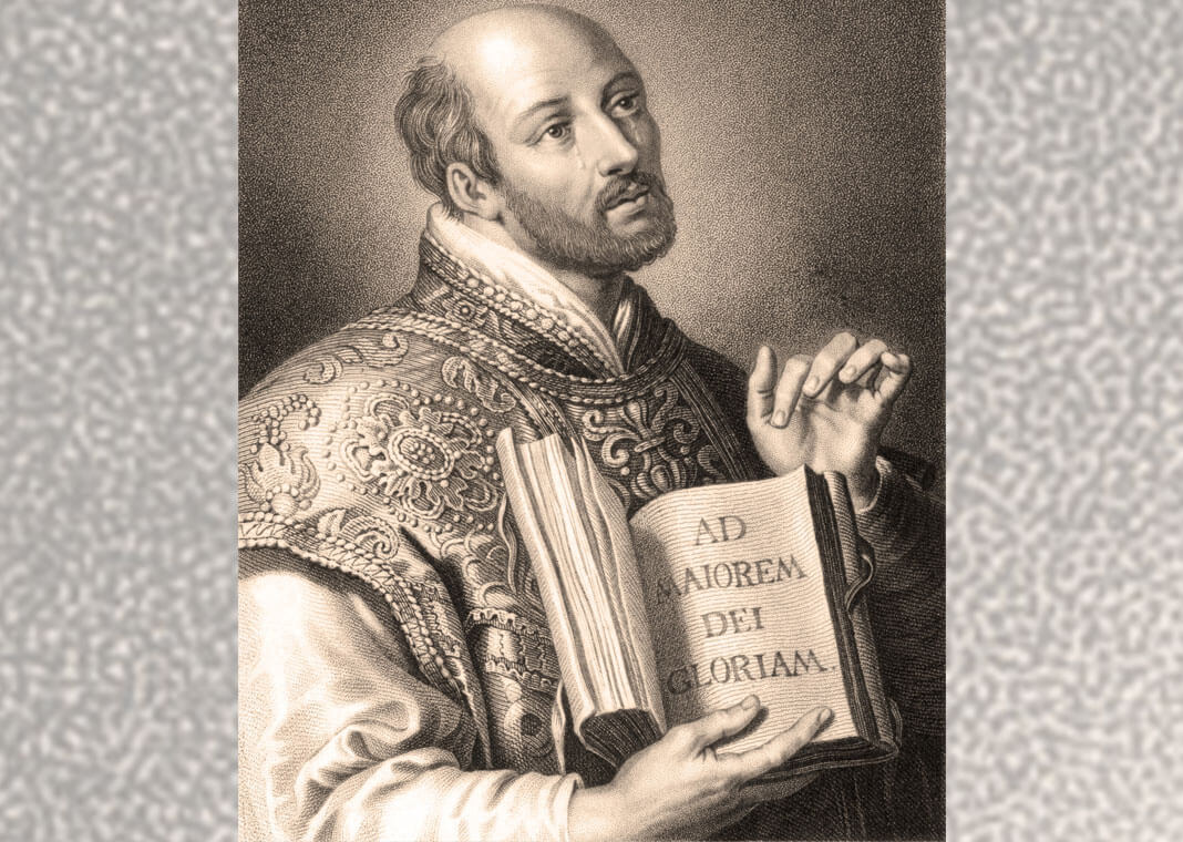 St. Ignatius with AMDG in book