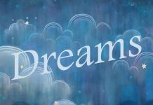 dreams - word floating on a starry cloudy sky background