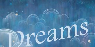 dreams - word floating on a starry cloudy sky background