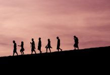 people following in a line - photo by Jehyun Sung on Unsplash