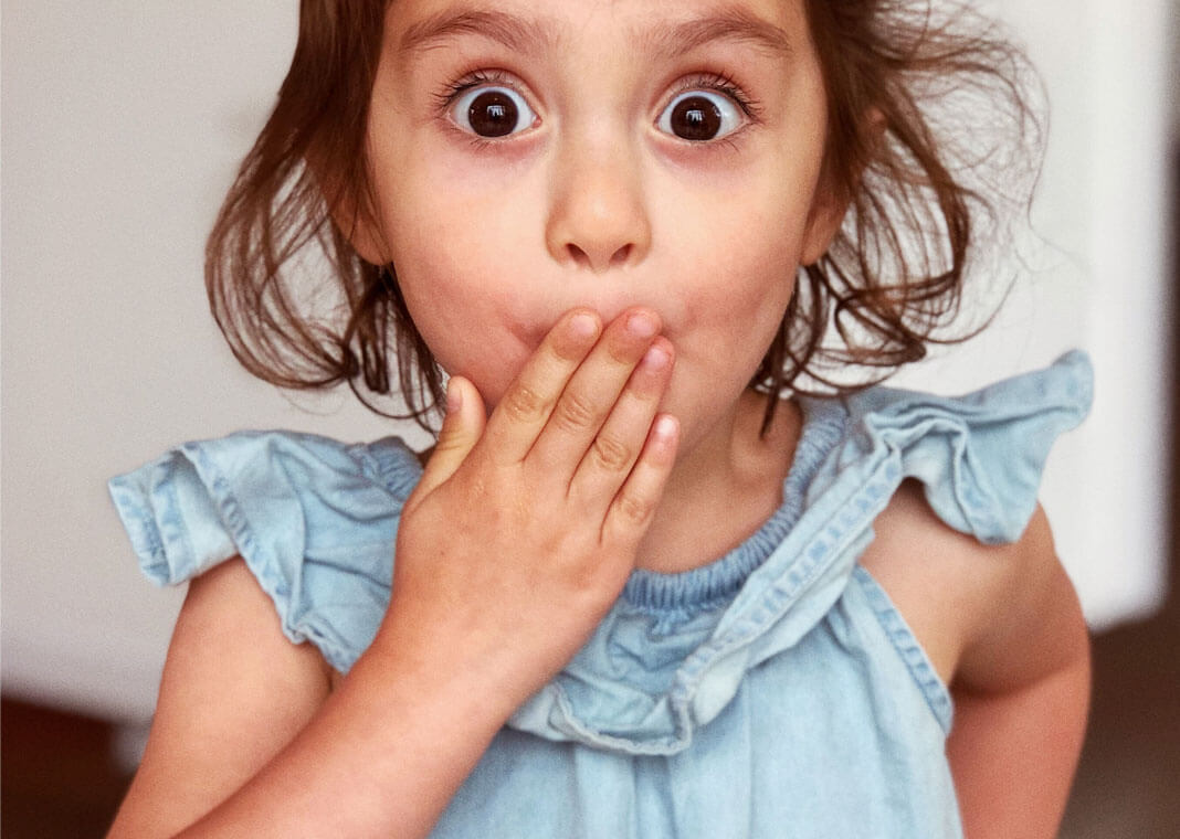 surprised girl - photo by Andre Guerra on Unsplash