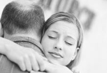 young woman hugging her father