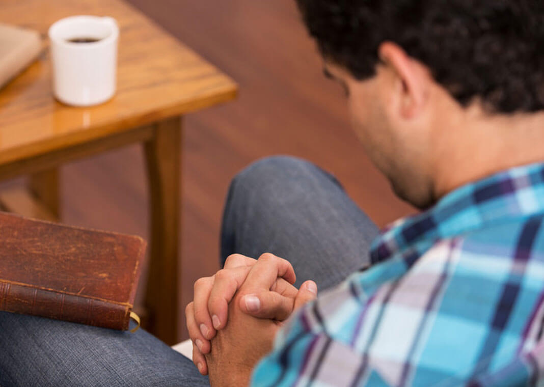 man praying