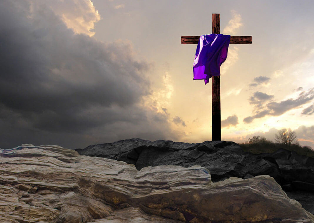 purple-draped cross