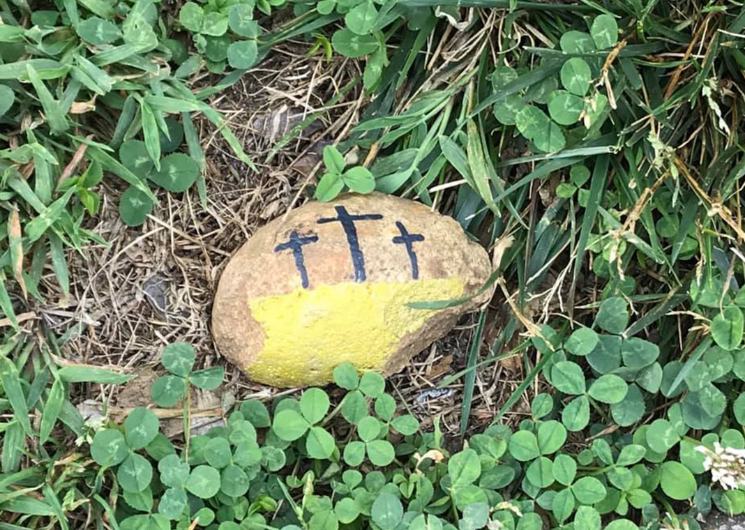 crosses painted on rock - photo by Kathleen Butler