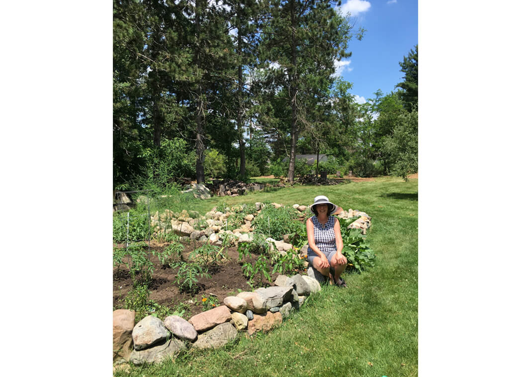 Jane Knuth with her tomato plants - photo by Tania Kazanjian