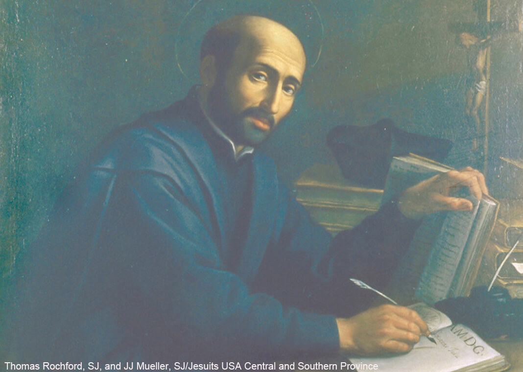 St. Ignatius sitting at his desk, writing