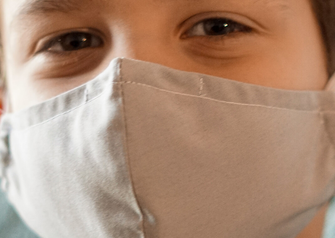 boy wearing mask - photo by Izzy Park on Unsplash